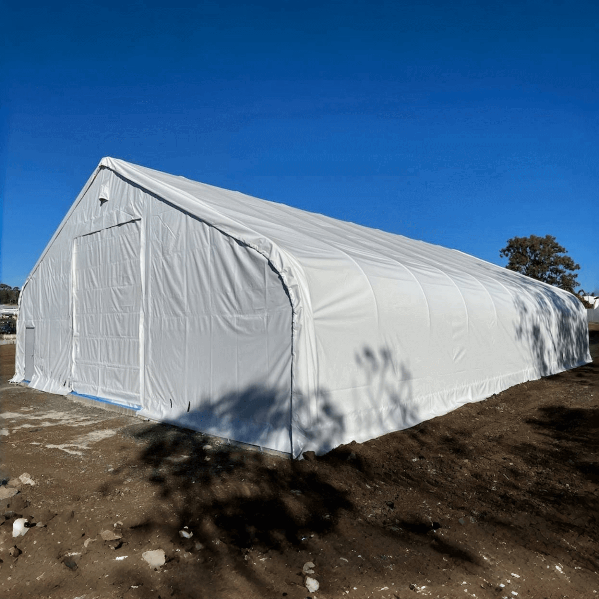 Double Truss Storage Shelter 70′ W × 120′ L × 28′ H