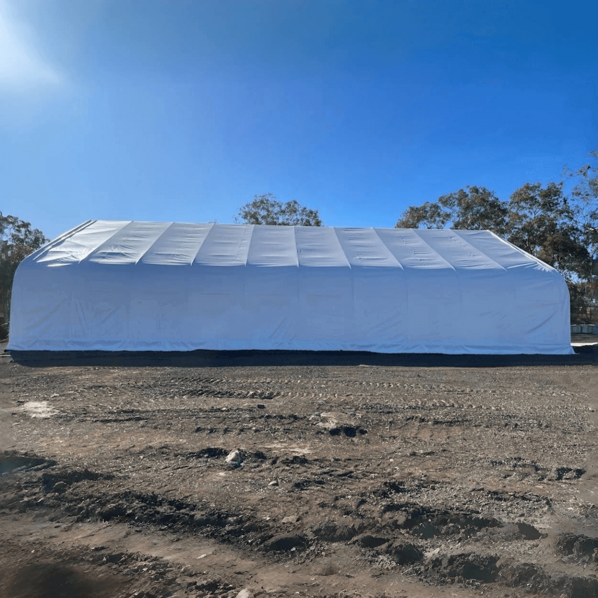 Double Truss Storage Shelter 70′ W × 120′ L × 28′ H