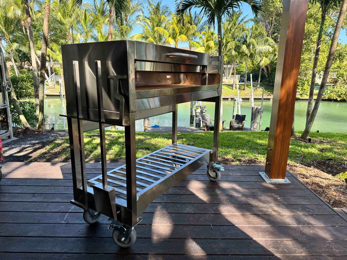 Tagwood BBQ Argentine Wood Fire & Charcoal Gaucho Grill BBQ18SS Stainless Steel Freestanding Grill with Shovel Poker & Heavy-Duty Casters for Mobility PRE-ORDER