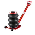 The Katool 3-ton bag air jack is shown at a front-side angle with its red base and handle, and a black three-bag bellows. The image has a Katool logo and with text specifying warehouse locations.