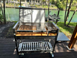 Tagwood BBQ Argentine Wood Fire & Charcoal Gaucho Grill BBQ18SS Stainless Steel Freestanding Grill with Shovel Poker & Heavy-Duty Casters for Mobility PRE-ORDER